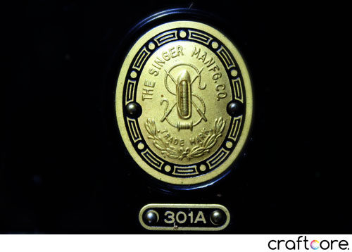 Singer 301 badge